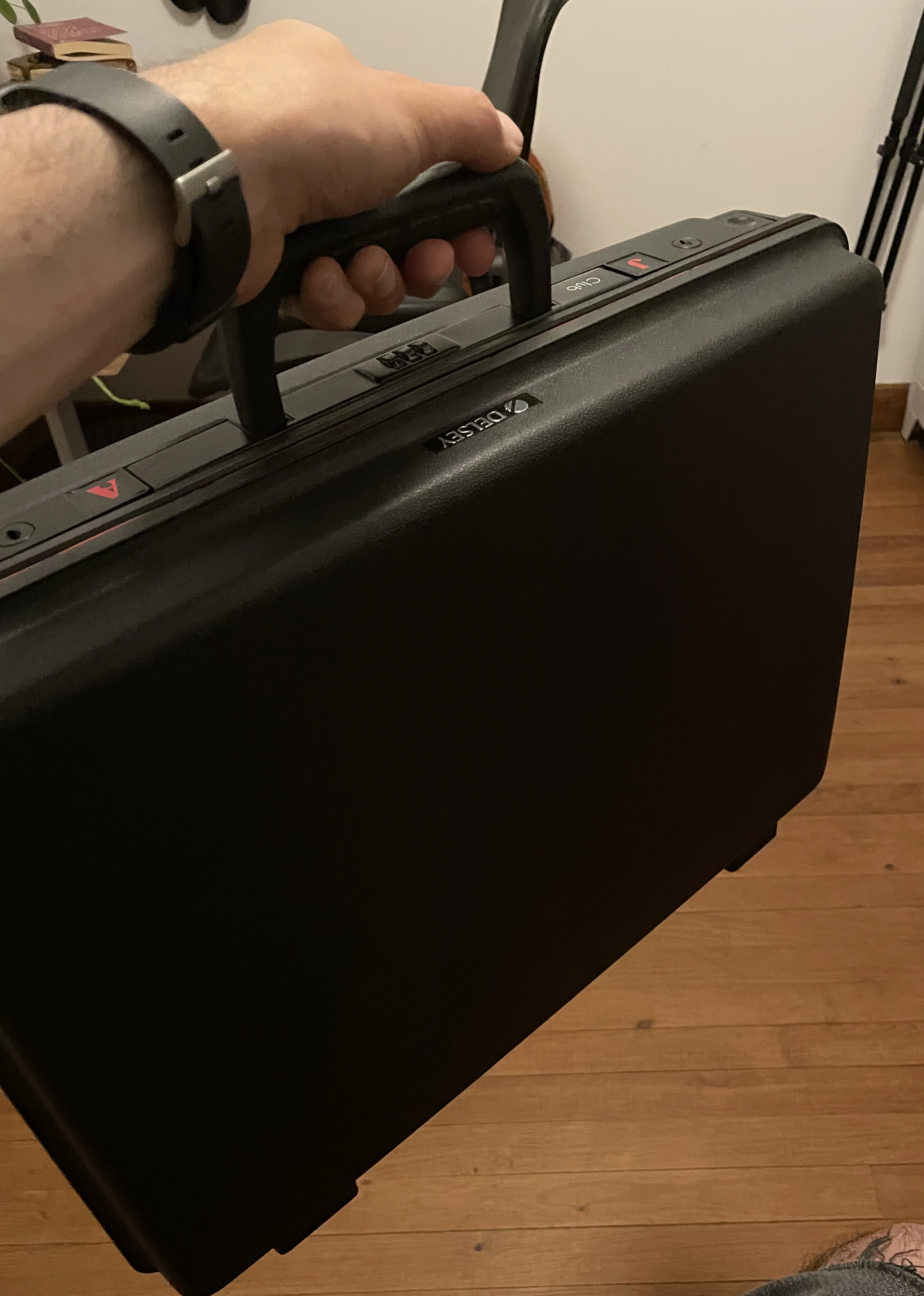 An attaché case on the ground