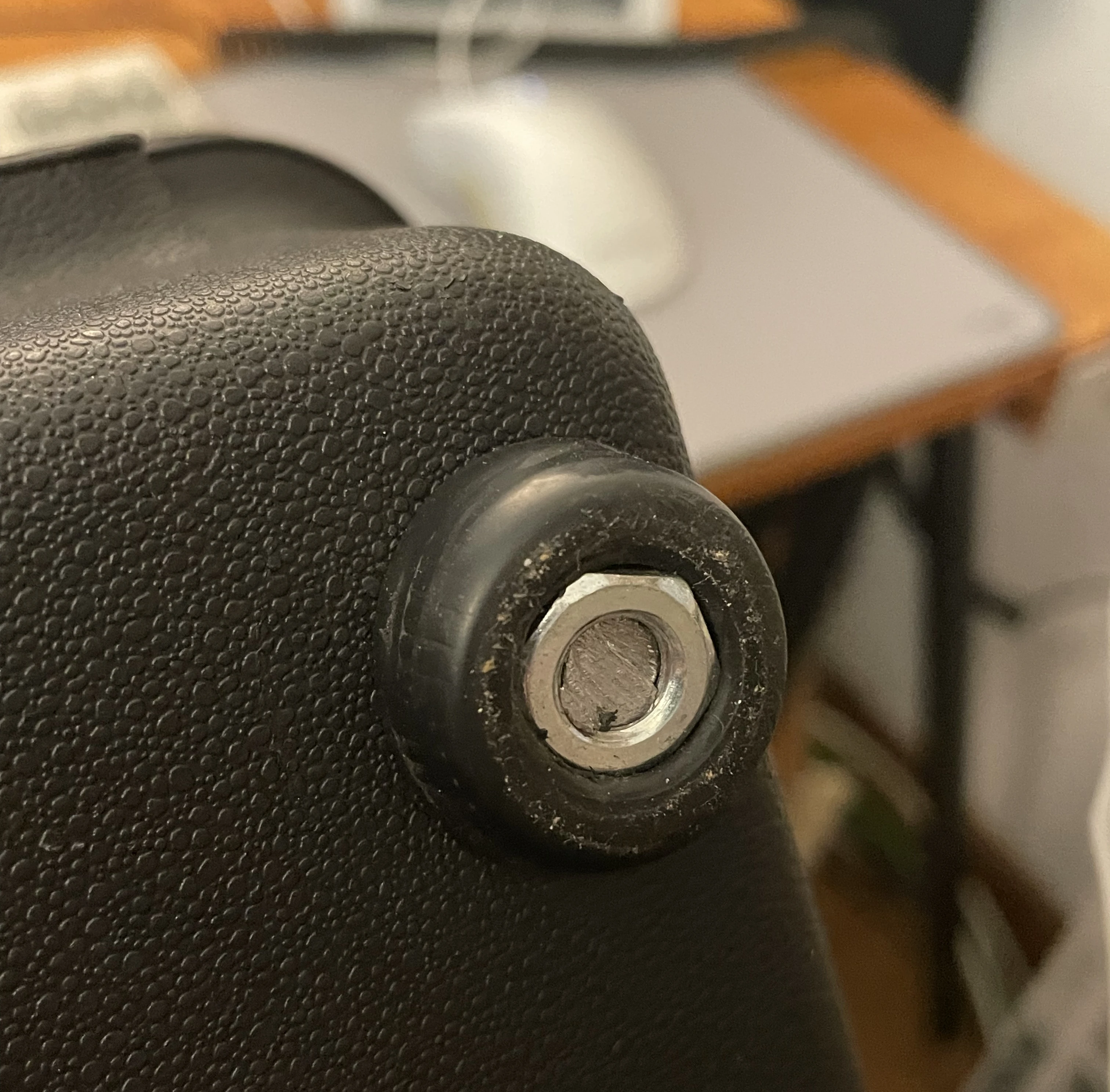 A rubber feet with a nut inside it